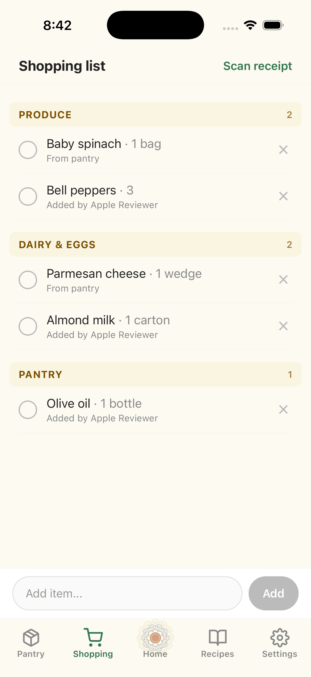 Shopping list grouped by aisle with attribution showing which member added each item